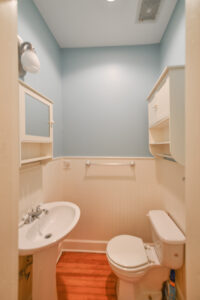 Powder room in hallway